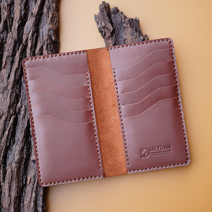 Handmade Wallet made in vegtan leather with 12 card slots and two compartments for currency bills